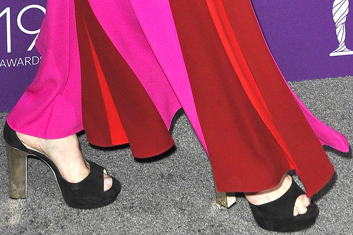 Meryl Streep shows off her feet in Jimmy Choo black suede platform sandals with chunky metallic heels