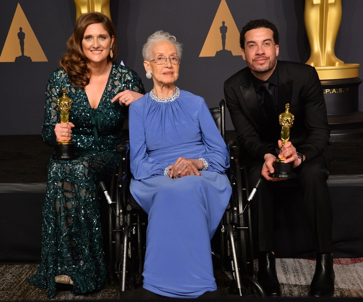 NASA mathematician Katherine Johnson (C) and director Ezra Edelman (R), and producer Caroline Waterlow (L), winners of Best Documentary Feature for 'O.J.: Made in America' pose in the press room during the 89th Annual Academy Awards