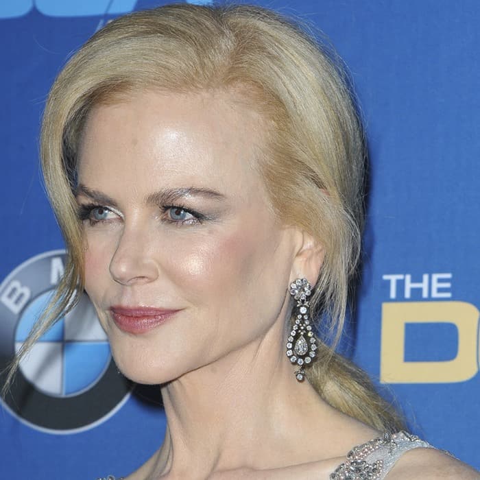 Nicole Kidman dazzles with statement drop earrings and soft, radiant makeup that enhances her timeless beauty on the red carpet