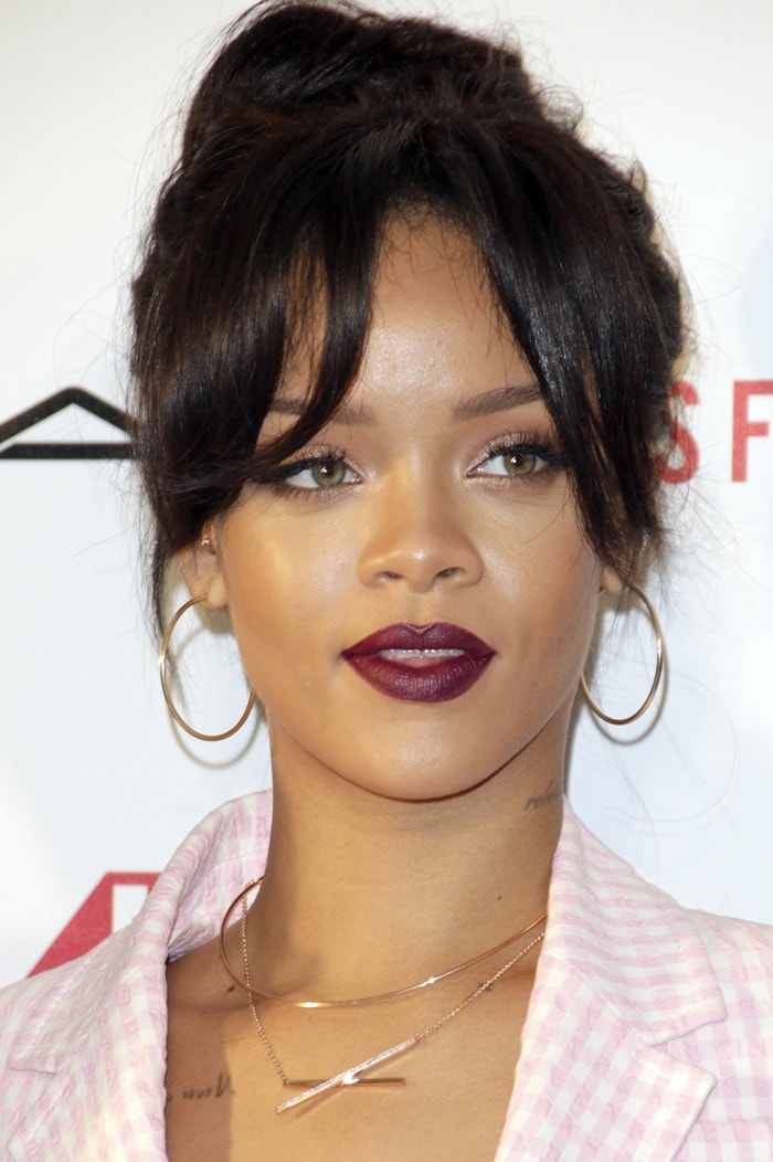 Rihanna wearing huge hoop earrings