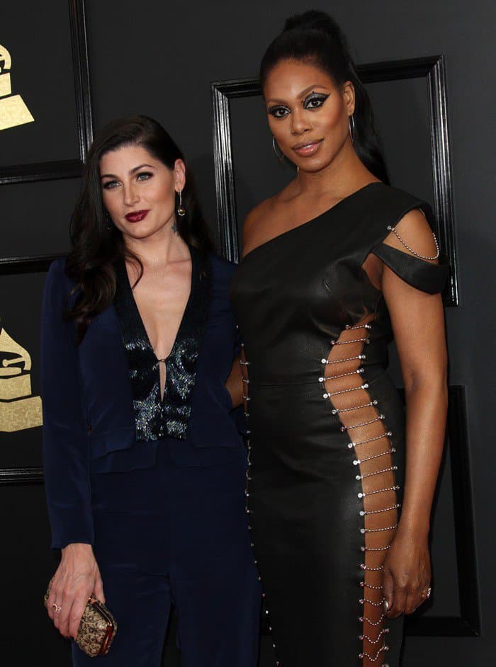 Laverne posing on the red carpet with Trace Lysette at the 59th Annual GRAMMY Awards