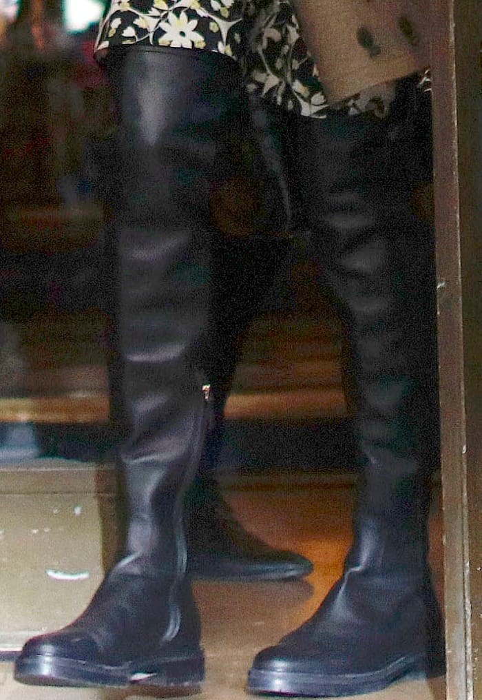 Amal Clooney wearing black over-the-knee boots in Paris