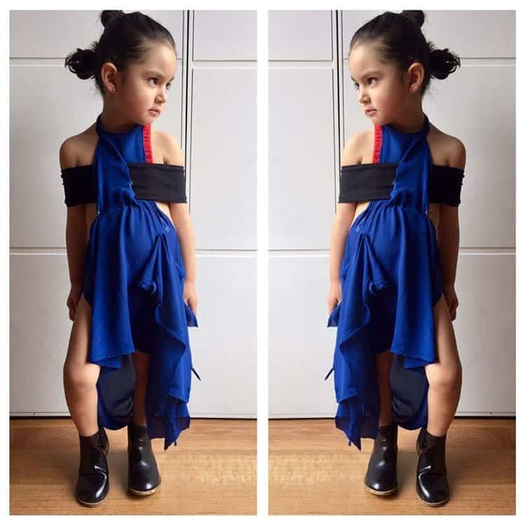 3-year-old Ana Molano Peña perfectly recreates Emma Watson's cobalt blue Louis Vuitton dress with matching ankle boots and a mini red-and-black accent for an adorable and stylish tribute