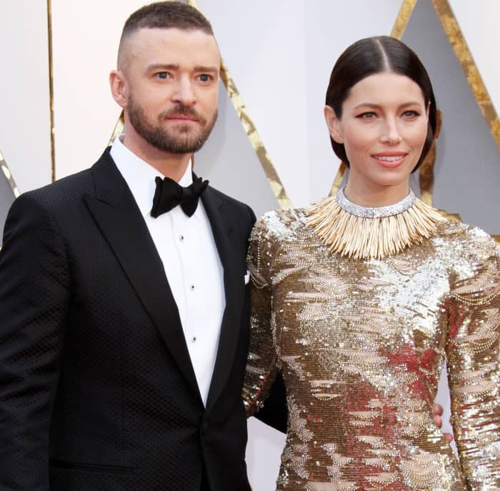 Justin Timberlake wearing a Tom Ford tuxedo and Jessica Biel wearing a gold and silver Kaufmanfranco gown at the 2017 Oscars