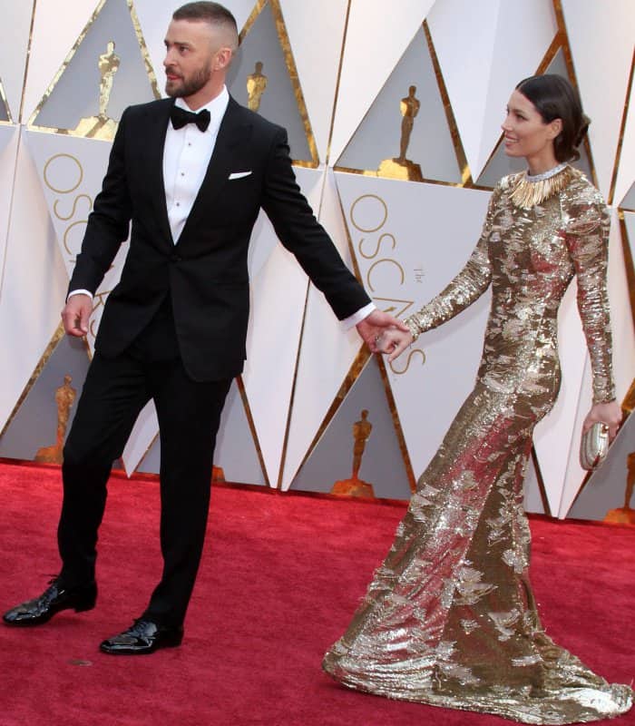 Justin Timberlake wearing a Tom Ford tuxedo and Jessica Biel wearing a gold and silver Kaufmanfranco gown at the 2017 Oscars