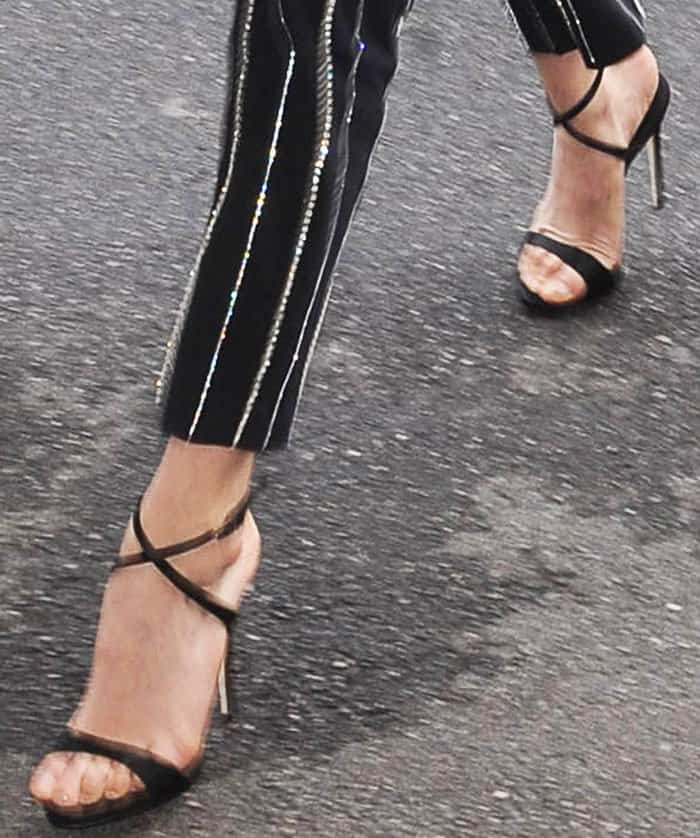 Bella exchanged her usual trainers for a sophisticated pair of Giuseppe Zanotti Dionne sandals