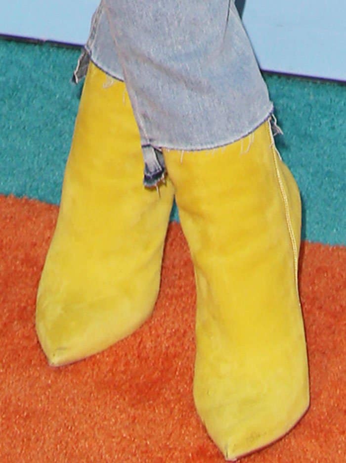 Blac Chyna's yellow suede "So Kate" ankle boots by Christian Louboutin