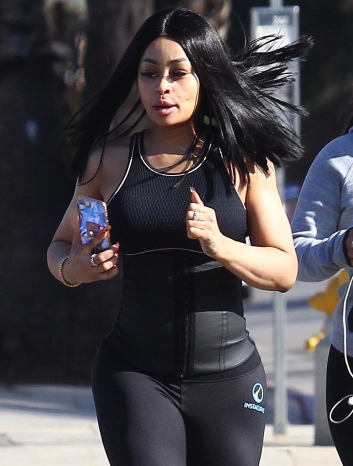 Blac Chyna wears high-waisted Instant Curve leggings — which feature heat-generating technology to help your body burn fat — while working out
