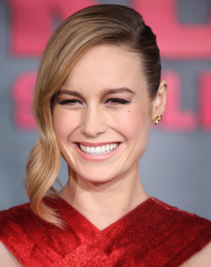 Brie Larson finished her look with Cartier jewelry, a glamorous updo, and light makeup