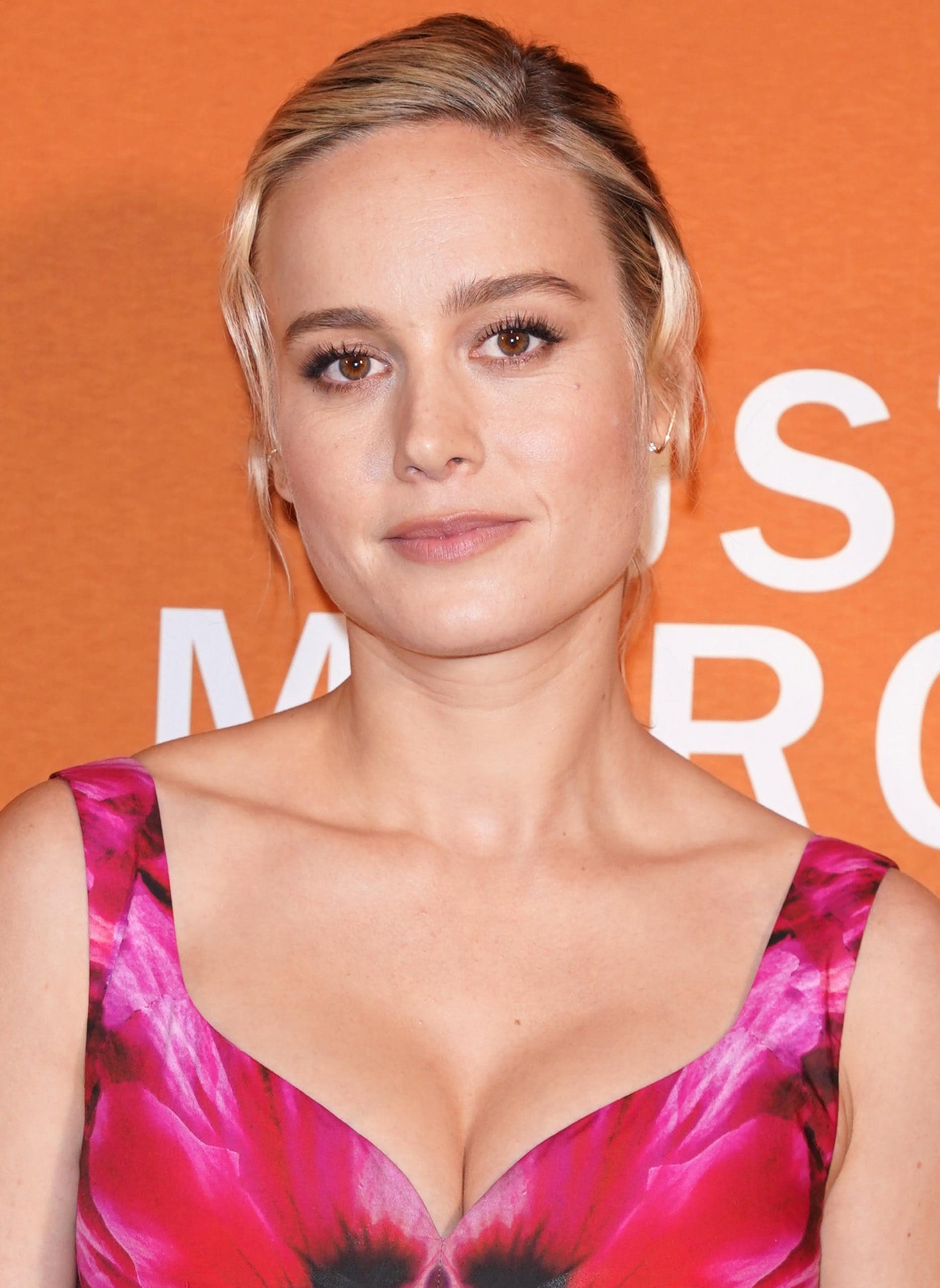 Brie Larson showcases her curves in a vibrant floral gown at the 'Just Mercy' event held in New York City