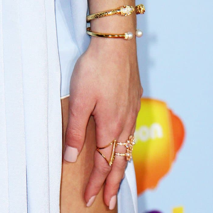 Chloe Lukasiak's generous layering of rings and cuffs from Nialaya Jewelry