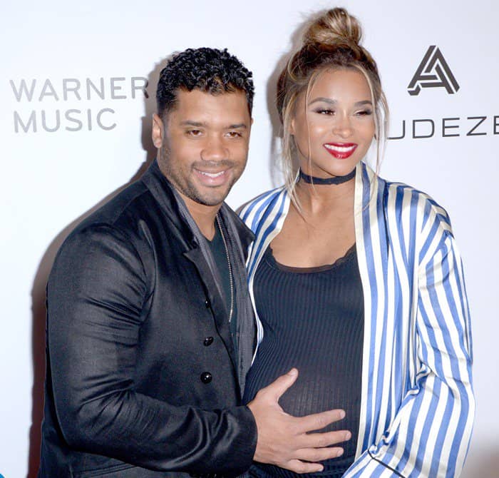 Russell Wilson, left, and Ciara attend the Warner Music Group’s Celebration of the 59th Annual Grammy Awards