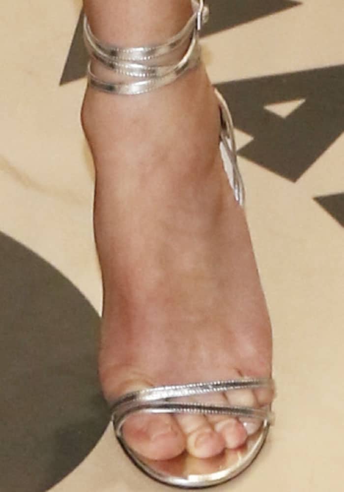 Diane brings on the shine in a pair of metallic Jimmy Choo Tizzy sandals