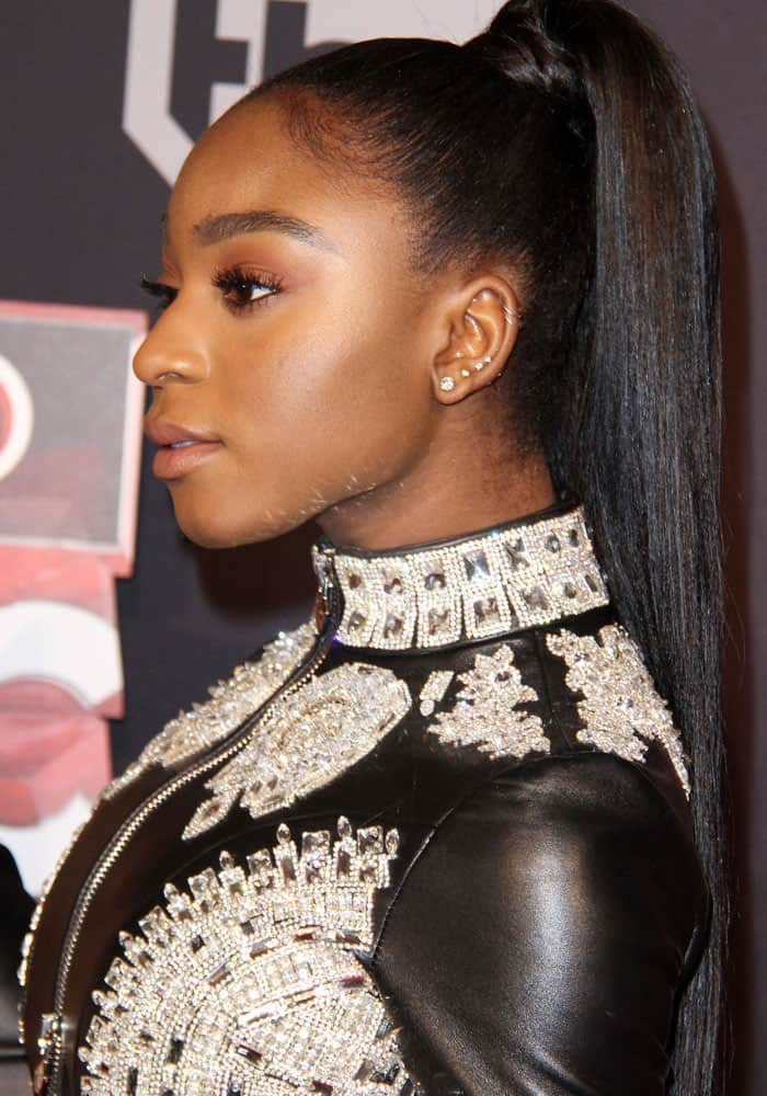 Normani wears a beautifully embellished leather jacket