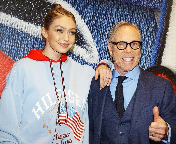 Gigi poses with the head designer himself, Tommy Hilfiger