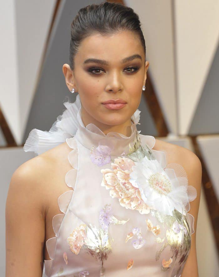Hailee Steinfeld stuns with a chic updo and smoky eye makeup