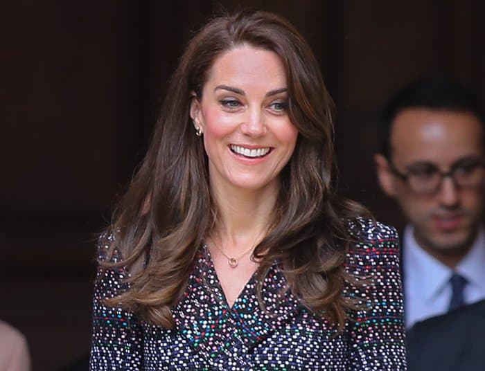 Kate Middleton exudes timeless elegance with the Cartier Trinity De Cartier necklace and diamond earrings in 18k white, yellow, and pink gold