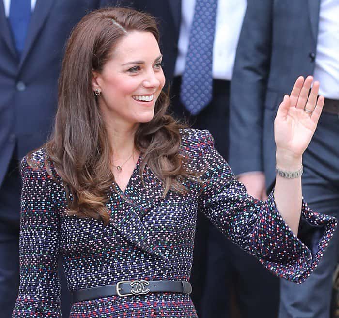 The coat was styled as a dress, cinched at the waist to accentuate Kate’s figure, creating a tailored and regal look