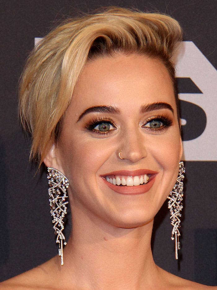 Katy Perry with quinoa stuck in her teeth