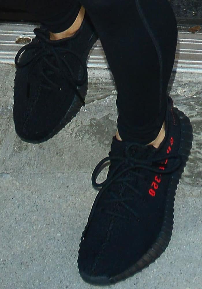 Kim wore a pair of Yeezy Boost 350 V2 sneakers from her husband Kanye's line