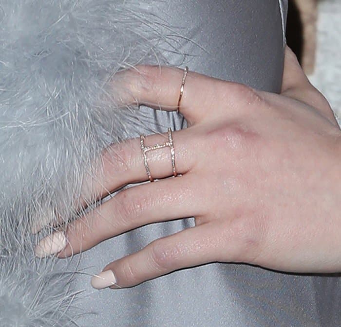 Madelaine Petsch's thin band rings and a rose gold Cartier ring band