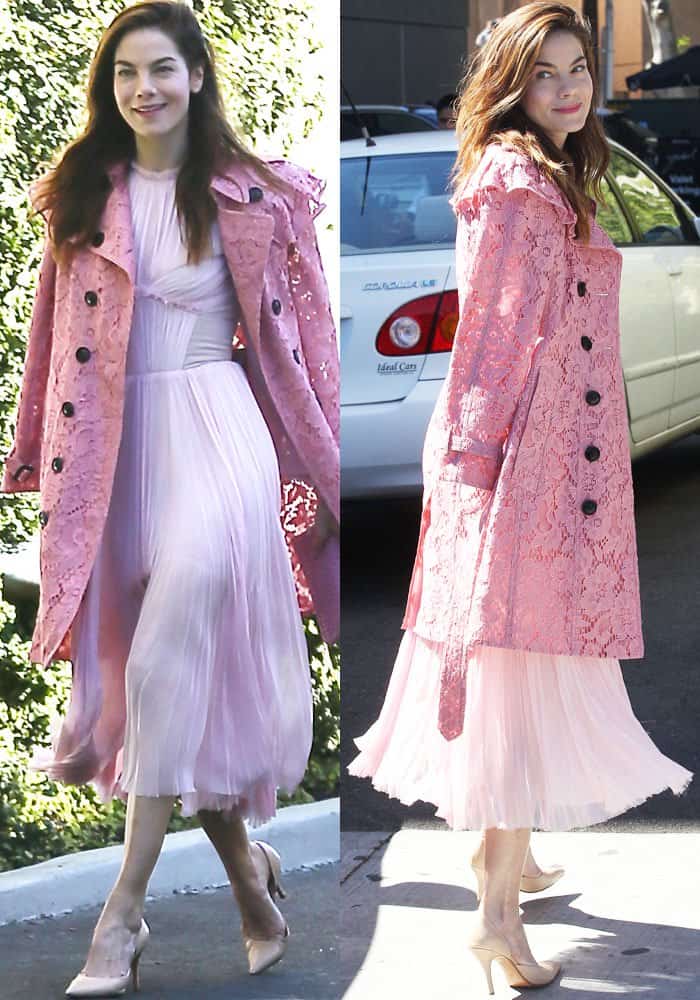 Michelle Monaghan pairs her romantic pink pleated dress and lace coat with nude d'Orsay pumps, which elongate her legs and enhance the outfit's soft elegance