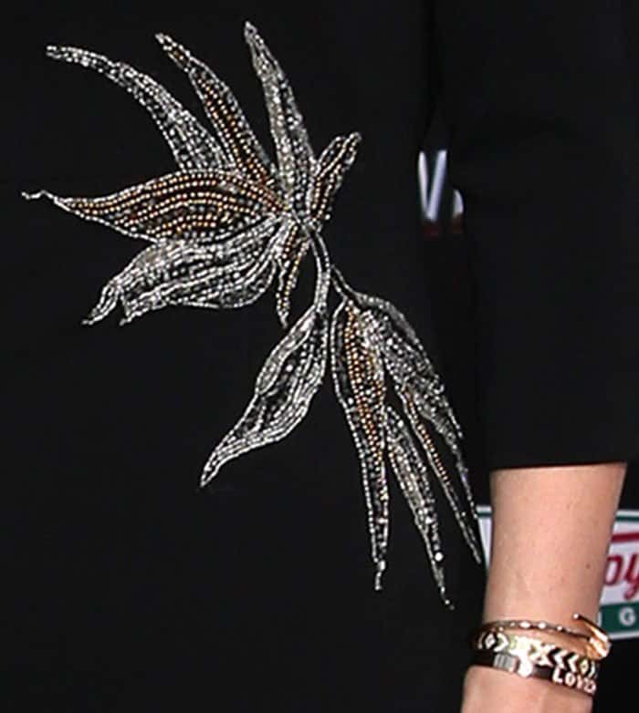 A close-up on the embellished details of Molly's Mestiza New York dress