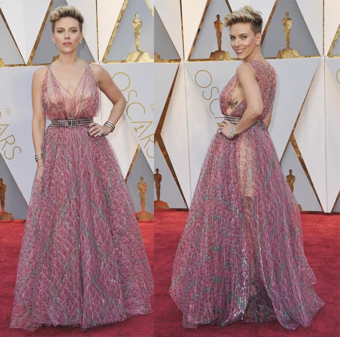 Scarlett Johansson shows off her feminine side in this pink gown. 