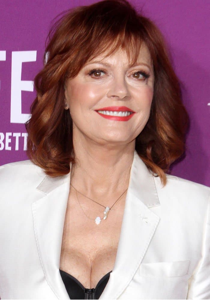 Susan Sarandon styled a Max Mara cream blazer with a little black brassiere