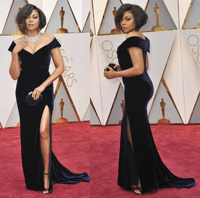 Taraji P. Henson exudes sophistication in a sleek off-the-shoulder velvet gown by Alberta Ferretti, complete with a thigh-high slit and statement necklace, showcasing timeless elegance