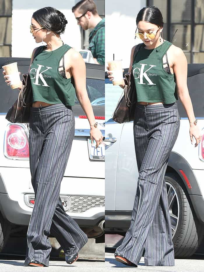 Vanessa Hudgens in loose striped gray pants that sat low on her waist
