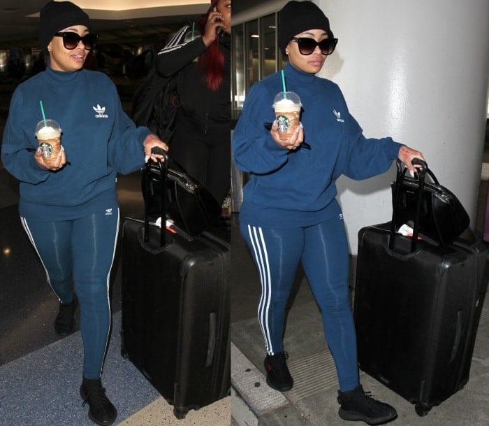 Blac Chyna wears skintight Adidas leggings at Los Angeles International Airport