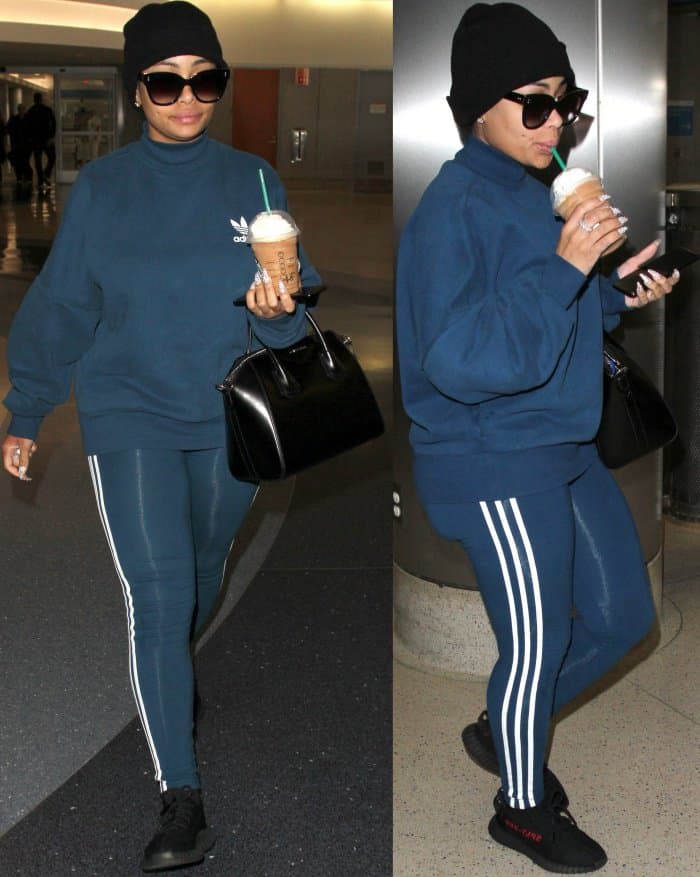 Blac Chyna enjoys an iced coffee drink from Starbucks at Los Angeles International Airport