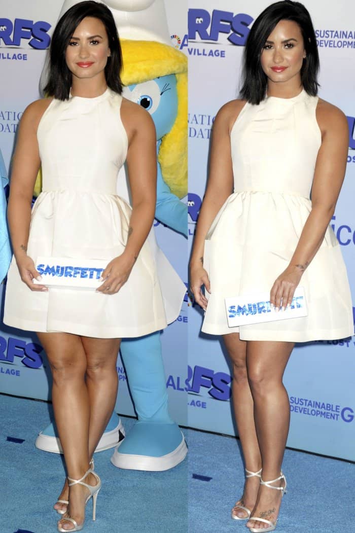 Demi Lovato flaunts her legs at the United Nations headquarters for the International Day of Happiness in conjunction with the “Smurfs: The Lost Village” event