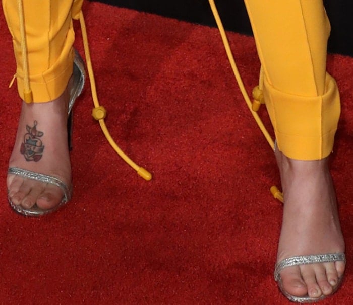 Halsey displays her feet in Stuart Weitzman sandals