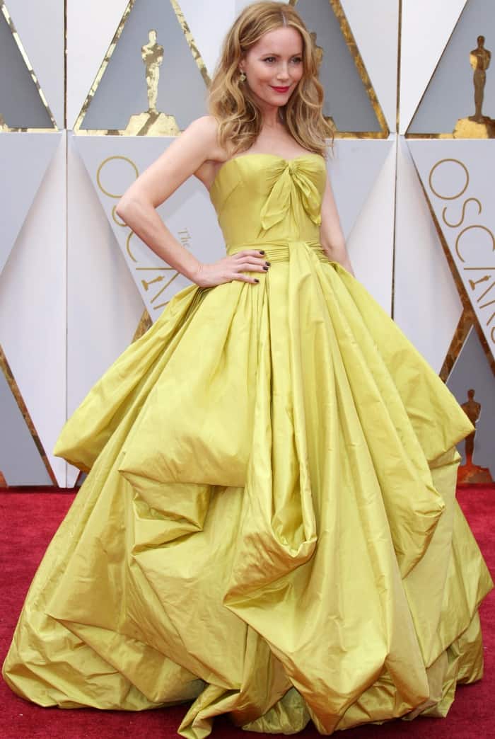Leslie Mann dazzles on the red carpet in a voluminous, chartreuse Zac Posen gown with intricate draping and a statement bow detail