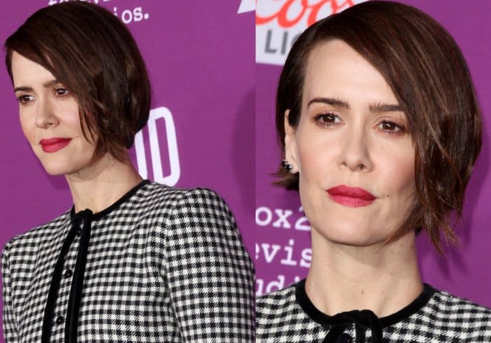 Sarah Paulson stuns with a sleek side-parted bob and classic glam makeup, featuring bold brows, soft smoky eyes, and a statement red lip for a timeless finish