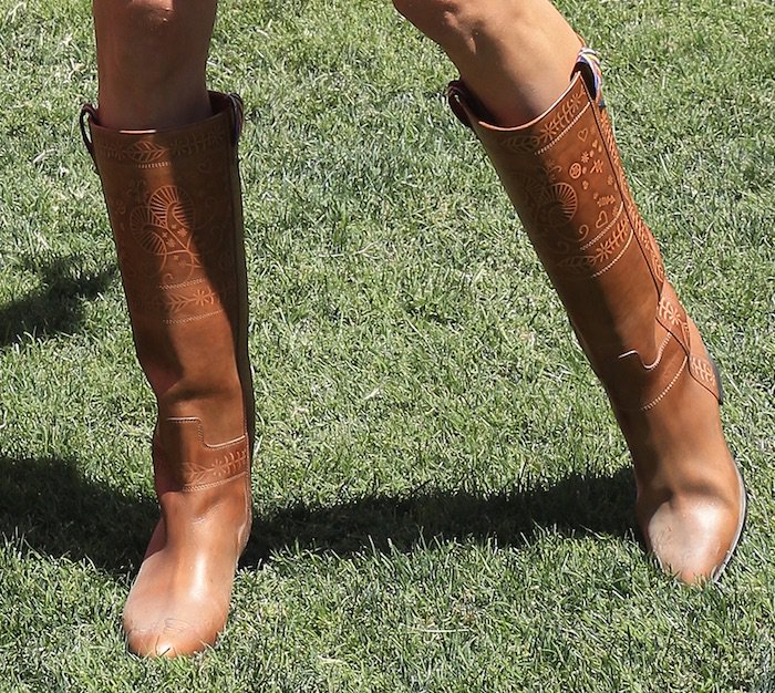 Alessandra Ambrosio finished her country chic ensemble with a pair of brown leather boots