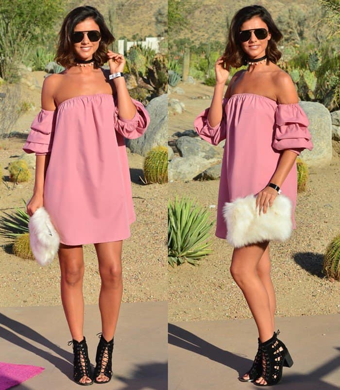 Lucy Mecklenburgh paired her flirty pink off-shoulder dress with black lace-up peep-toe booties and a fluffy white clutch at the PrettyLittleThing x Paper Coachella party