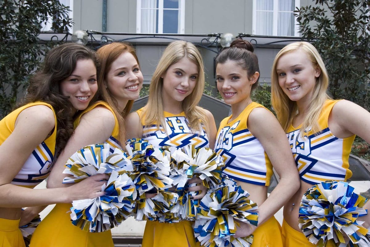 The "Fab Five" cheerleaders, played by Jessica Heap, Aimee Spring Fortier, Ashley Benson, Stephanie Honoré, and Ashlynn Ross, pose together in a scene from Fab Five: The Texas Cheerleader Scandal
