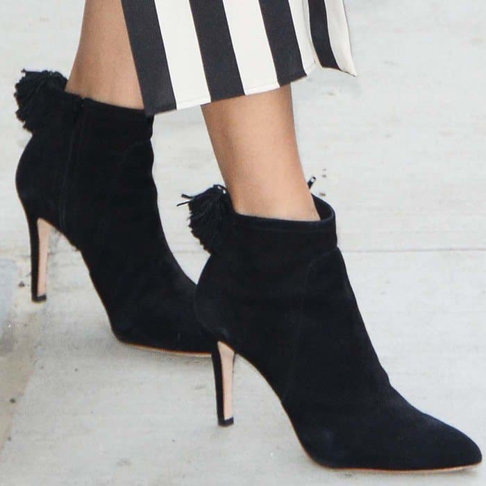 Freida wearing Loeffler Randall 'Maryl' suede pompom booties