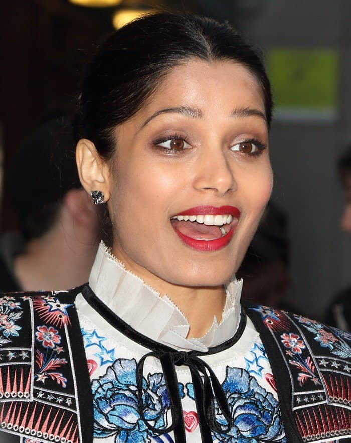 Freida Pinto accessorized with John Hardy ‘Legends’ button earrings