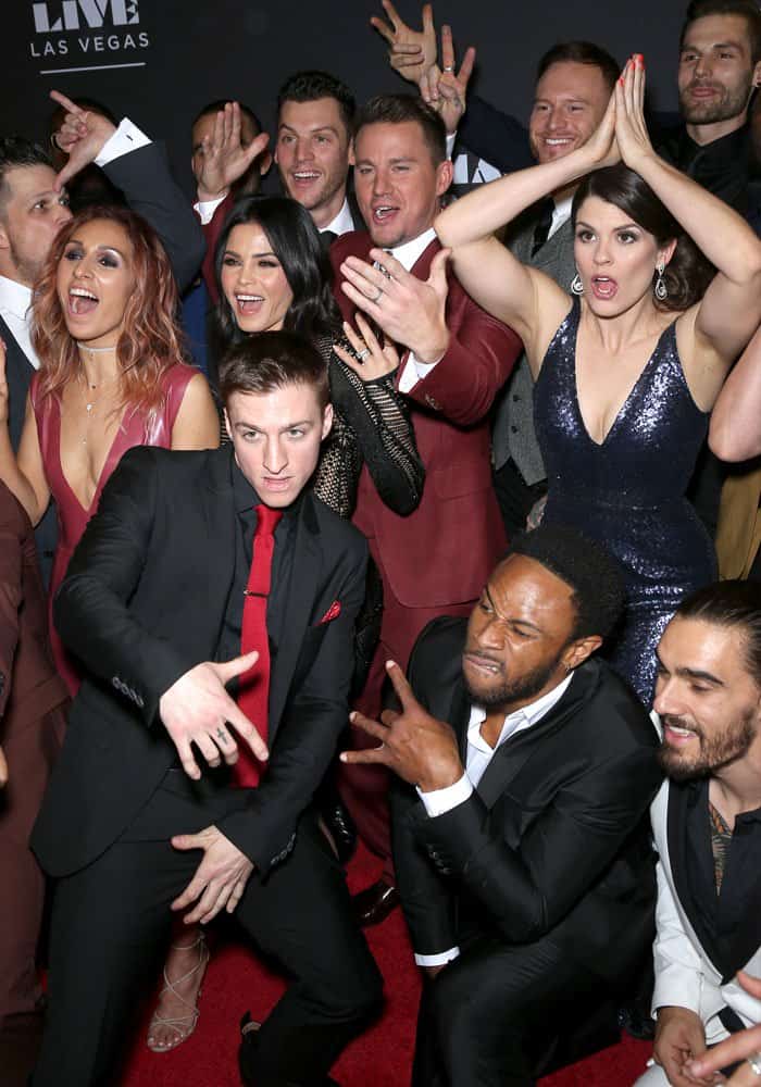 The cast of "Magic Mike Live" enjoys some camera time on the red carpet