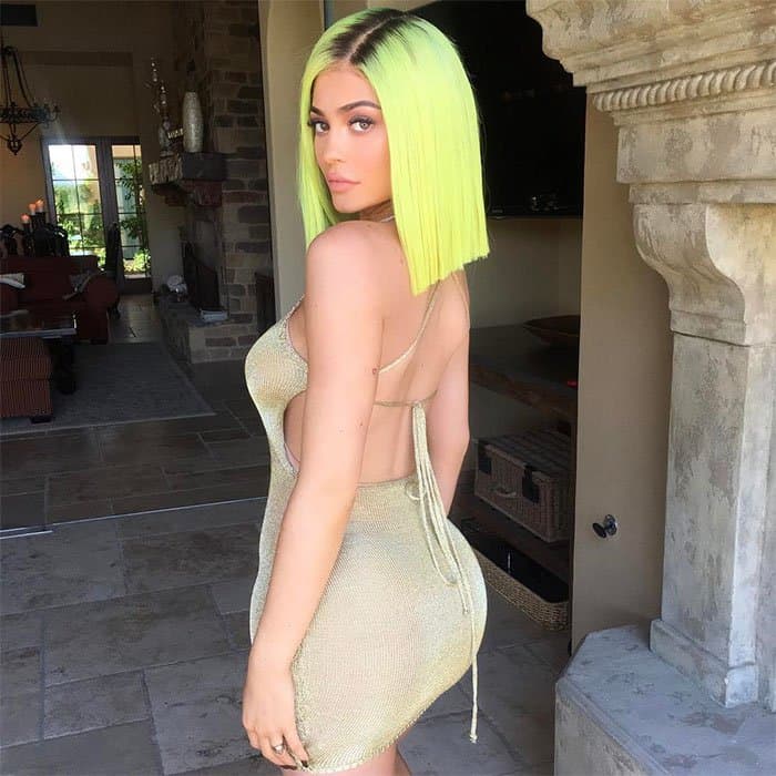 Kylie Jenner's Instagram post of her 2017 Coachella Music and Arts Festival Day 1 outfit that she captioned "highlighter hair 🌈" -- posted on April 14, 2017.