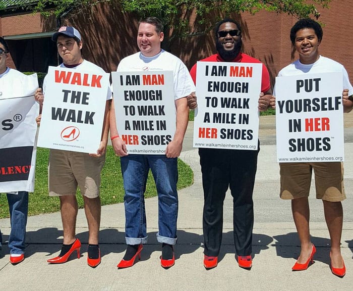 Students and faculty members of Lamar University march a mile together to support the cause