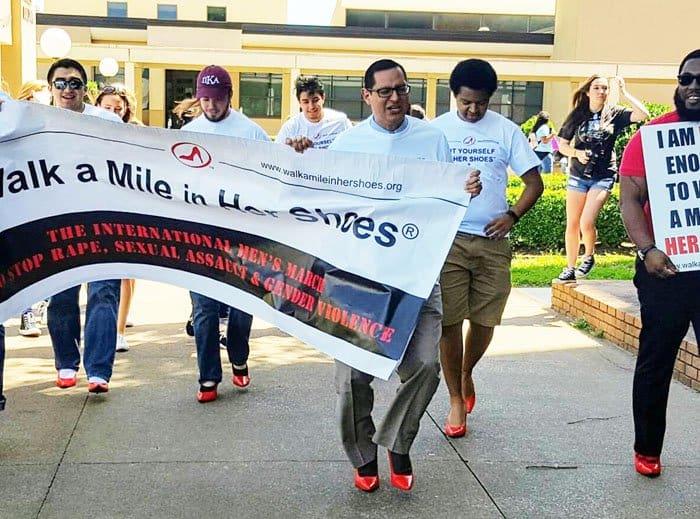 Students and faculty members of Lamar University march a mile together to support the cause