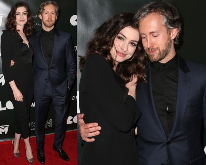 Anne Hathaway and Adam Shulman share a moment, radiating love and partnership, at the Los Angeles premiere of 'Colossal' at the Vista Theater