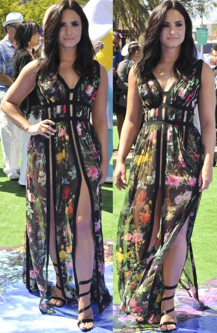 Demi Lovato wearing a Tadashi Shoji floral dress and Gianvito Rossi 'Opera' sandals at the 'Smurfs: The Lost Village"