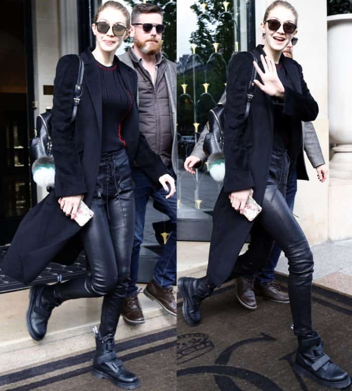 Gigi Hadid confidently donned a pair of black leather lace-up pants paired with a ribbed knit top and a tailored Winonah wool blend overcoat