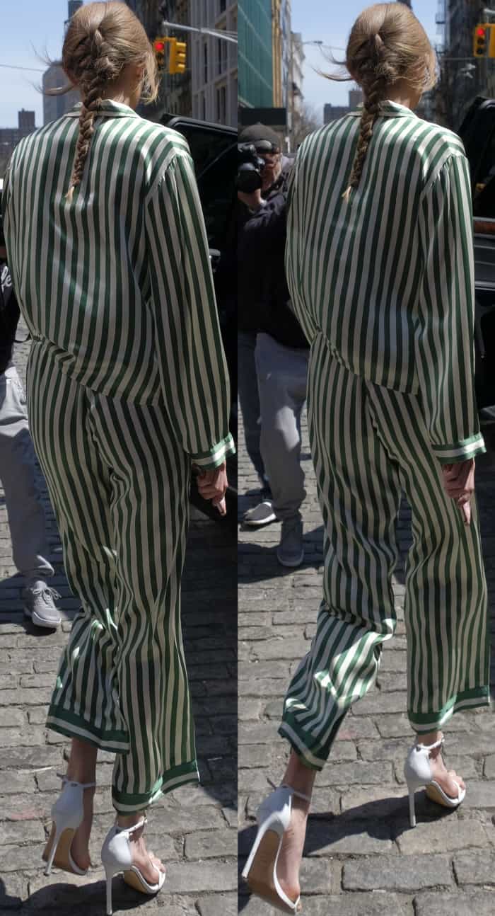 Gigi Hadid wearing a Morgan Lane emerald silk pajama set and Stuart Weitzman "Nudistsong" sandals in NYC